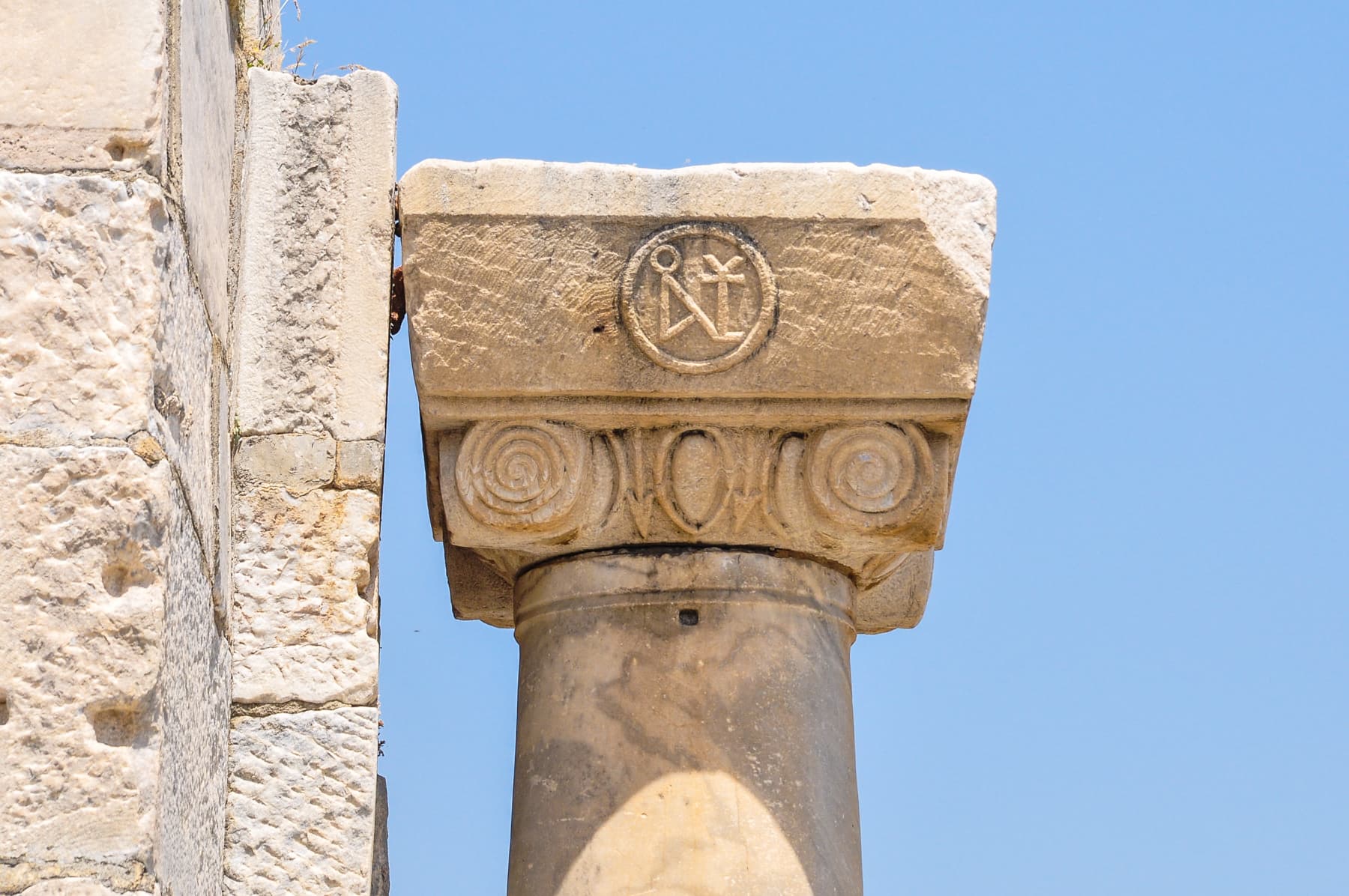 Capital with Monogram